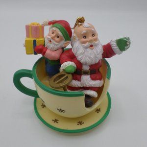 Vintage 1994 High Progress Christmas Ornament Santa and Helper in Tea Cup